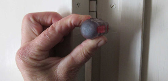 Removing painted door screws Step 1