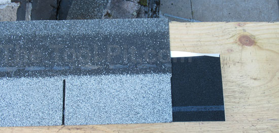 Starter shingle roll next to a 3-tab shingle