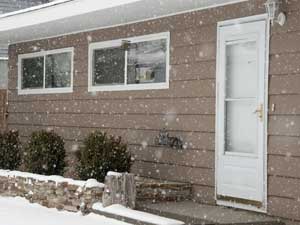 Emco Plus storm door on house