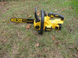 Dewalt cordless battery chainsaw outdoors